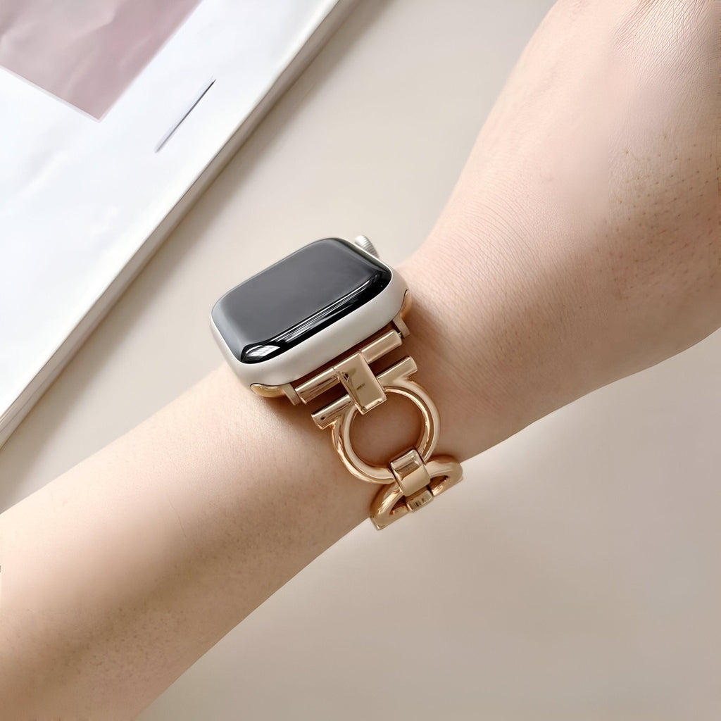Bracelet Apple Watch or rosé au design circulaire, style bijou élégant pour femme.