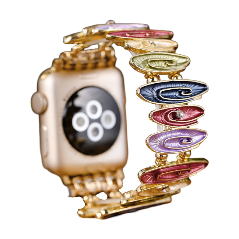 Bracelet Apple Watch femme Marisol multicolore, maillons ovales émaillés et finition dorée.