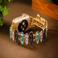 Bracelet Apple Watch femme Marisol multicolore en métal doré orné de maillons colorés ovale.