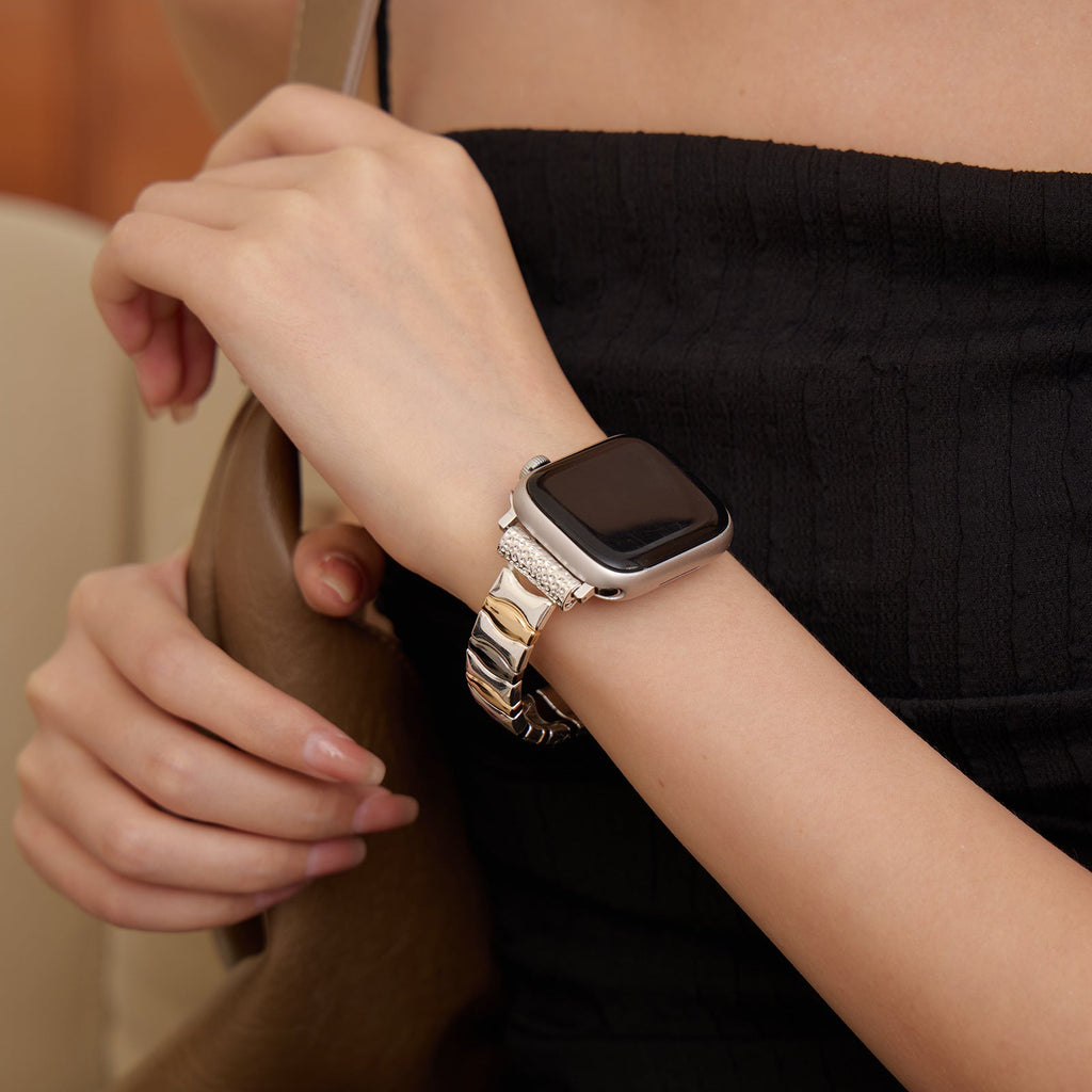 Bracelet métallique argenté pour Apple Watch, modèle Dolores, style élégant pour femme.