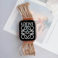 Bracelet Apple Watch femme or rosé en acier inoxydable avec maillons fins et élégants.