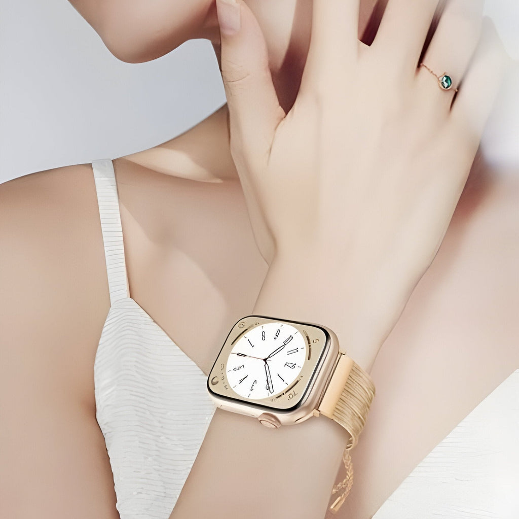 Bracelet Apple Watch femme en acier inoxydable or rosé, design mailles fines élégantes.