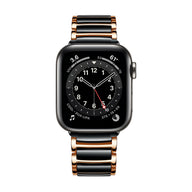 Bracelet Apple Watch noir et or rosé en acier inoxydable pour homme, modèle Delta, maillons lisses.
