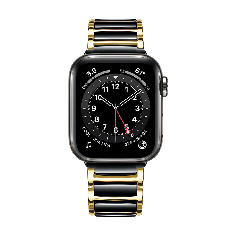 Bracelet Apple Watch en acier inoxydable noir et or avec maillons larges et finition brillante.