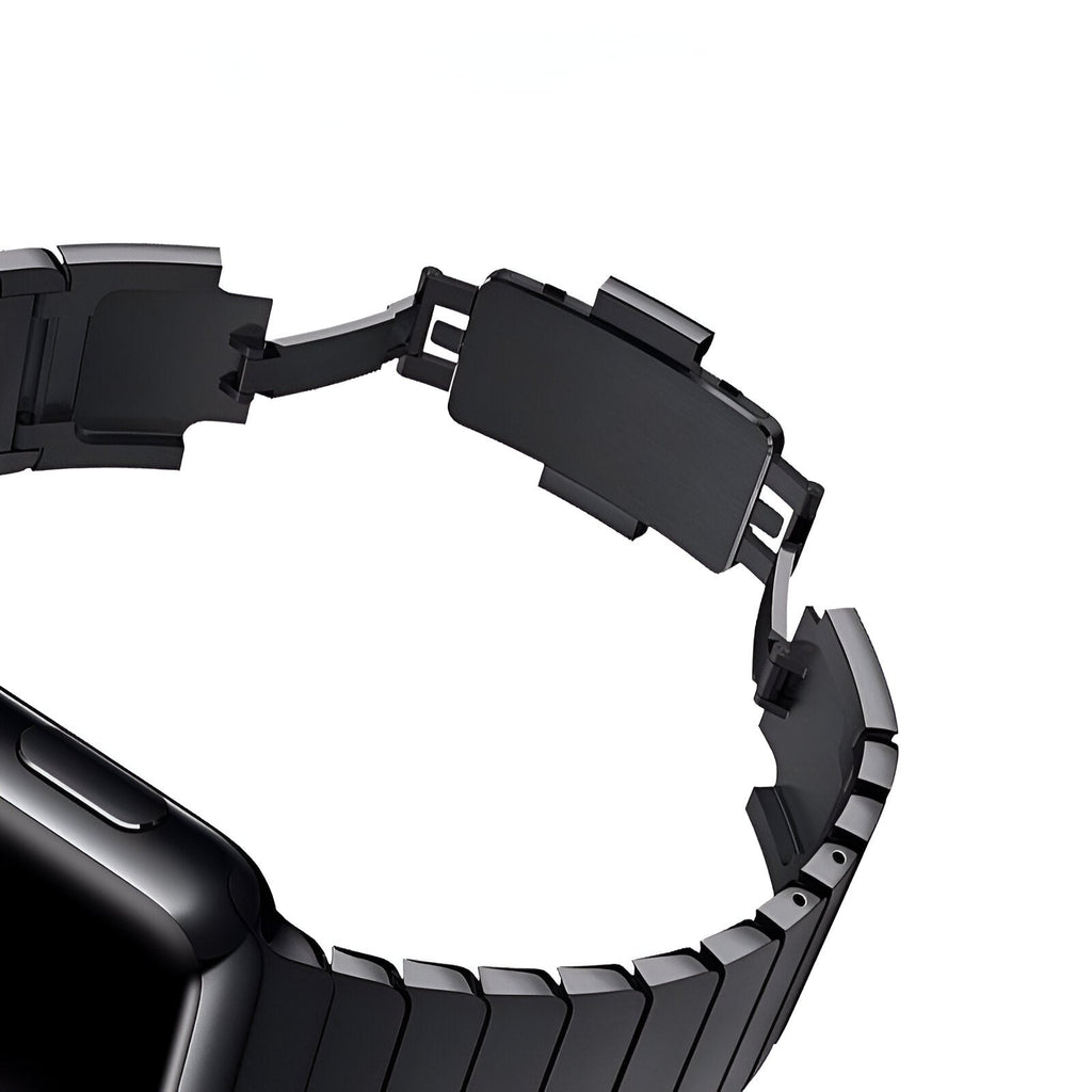 Bracelet Apple Watch noir en acier inoxydable, maillons larges et fermoir papillon élégant.