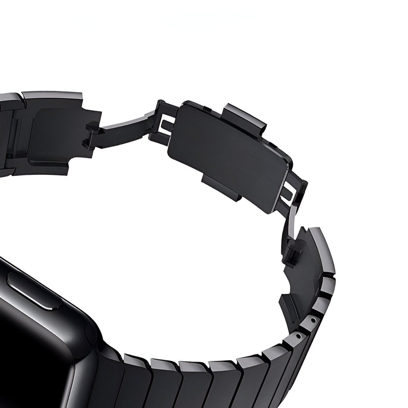 Bracelet Apple Watch noir en acier inoxydable, maillons larges et fermoir papillon élégant.