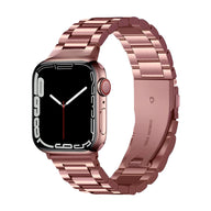 Bracelet Apple Watch en acier inoxydable or rosé, style maillons larges pour homme.