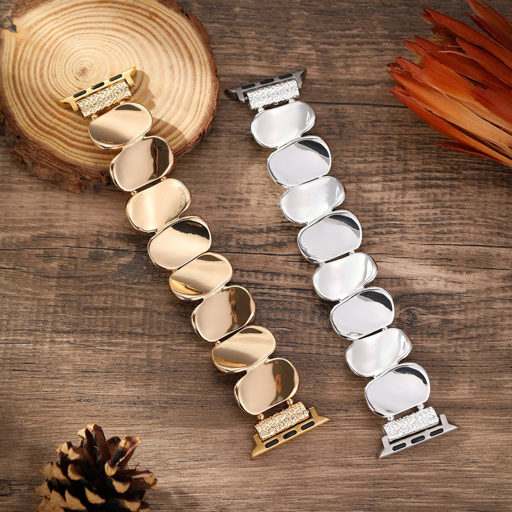 Bracelet Apple Watch en alliage métallique, maillons ovales, finition or et argent, pour femme.