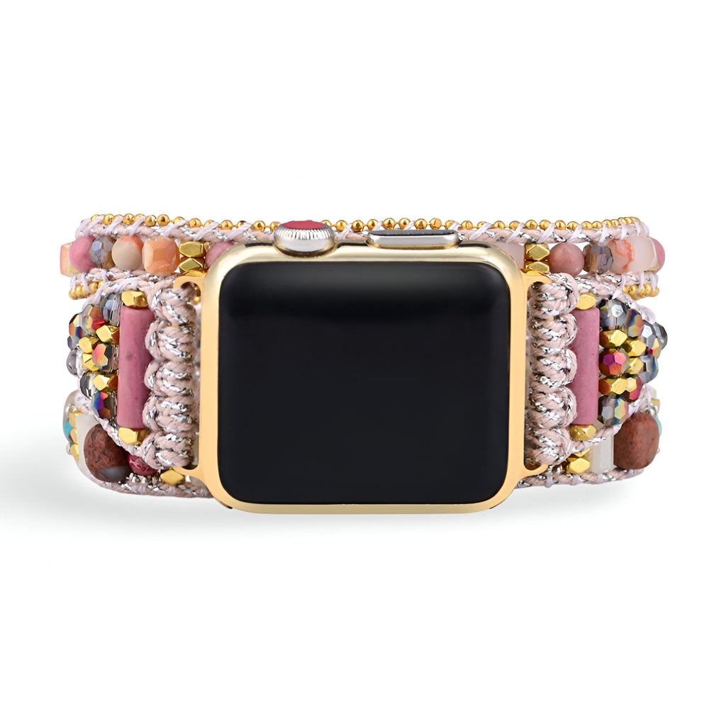 Bracelet Apple Watch rose en cristal avec perles et détails dorés, style élégant pour femme.