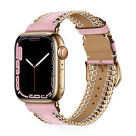 Bracelet Apple Watch en cuir rose avec chaîne métal or, boucle ajustable.