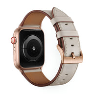 Bracelet Apple Watch en cuir blanc avec intérieur marron et boucle rose doré, style Jano.