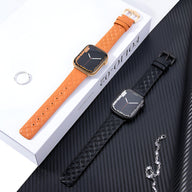 Bracelet Apple Watch cuir orange avec couture apparente et boucle dorée, taille 38-42 mm, côté noir mat avec boucle noire.