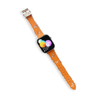Bracelet Apple Watch en cuir orange avec motif papillons blancs, boucle argentée, modèle Irael pour femme.