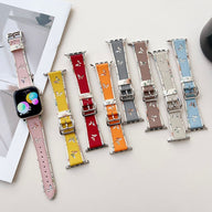 Lot de bracelets Apple Watch en cuir avec motif papillons, couleurs rose, jaune, rouge, orange, gris, marron et bleu.