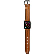Bracelet Apple Watch en cuir pleine fleur marron, coutures apparentes, boucle métallique argentée.