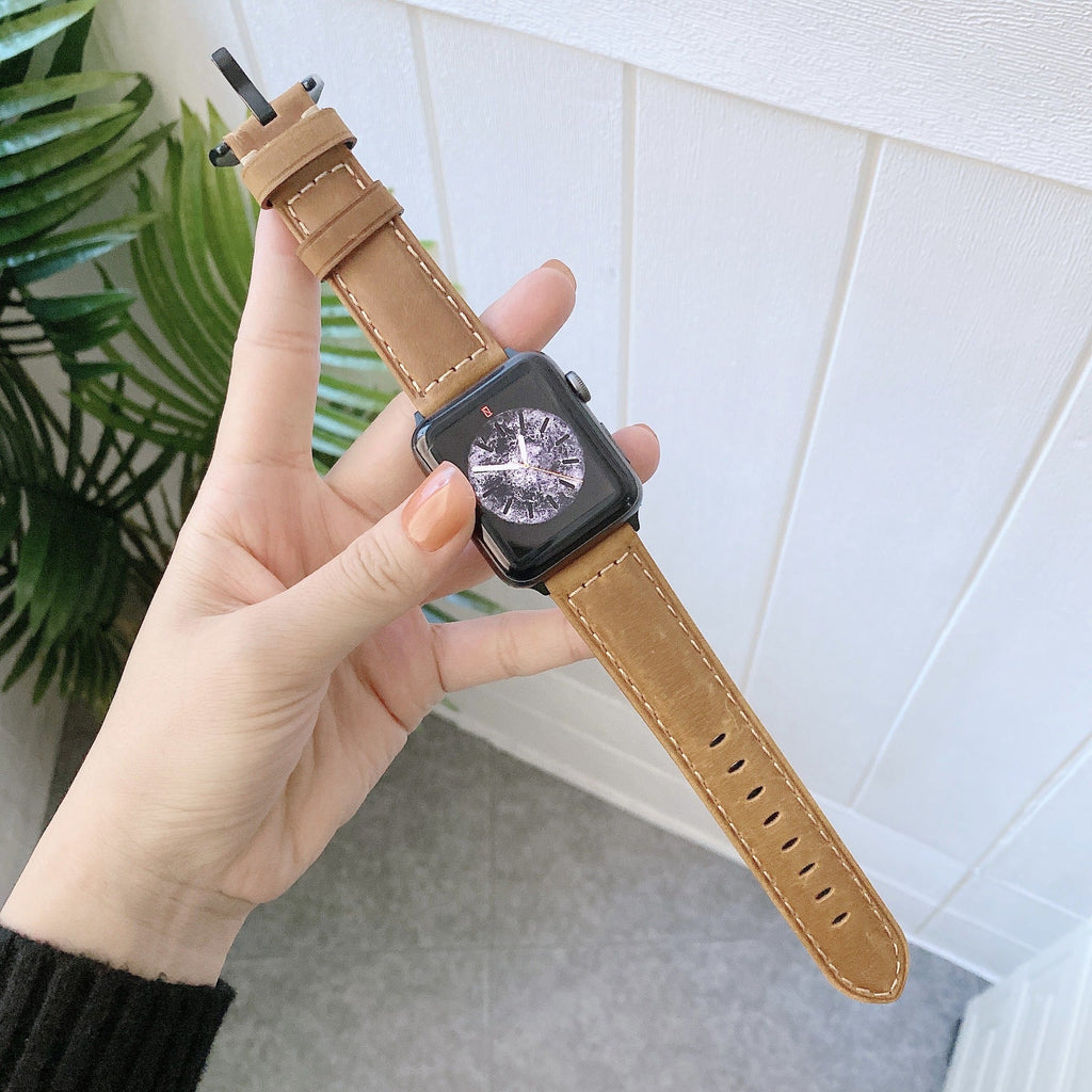 Bracelet Apple Watch en cuir marron avec surpiqûres contrastantes pour femme, taille 38-42 mm.