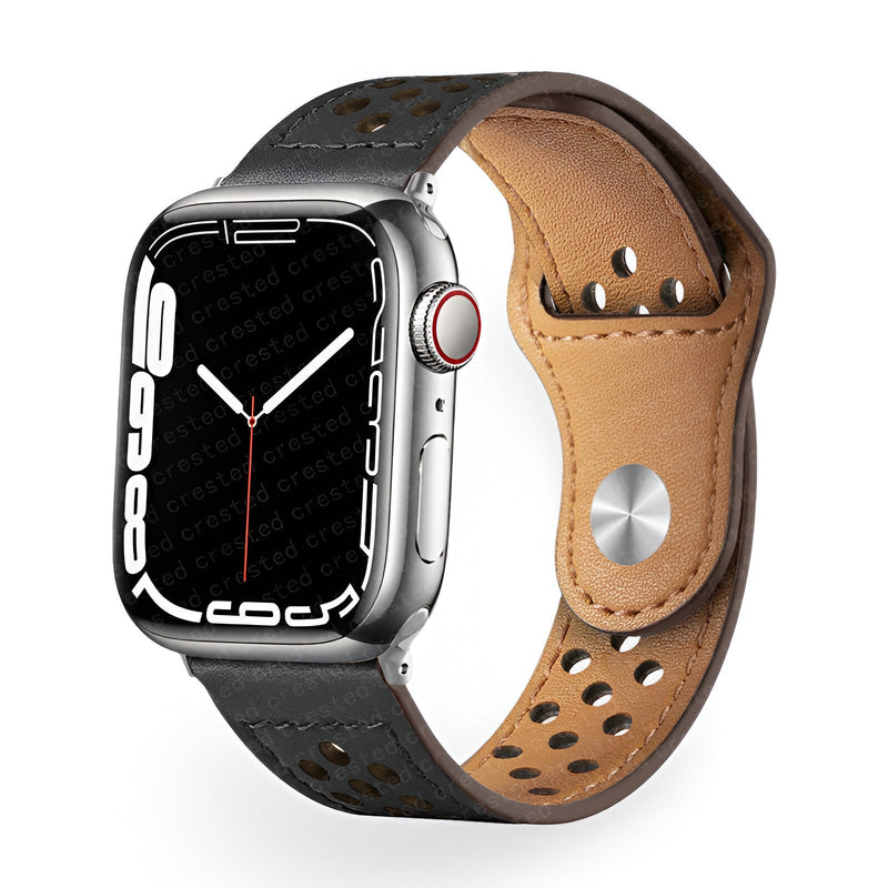 Bracelet Apple Watch en cuir noir perforé, intérieur marron clair, boucle métallique argentée.