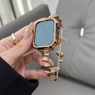 Bracelet pour Apple Watch en métal torsadé or rosé, style élégant avec chaîne réglable.