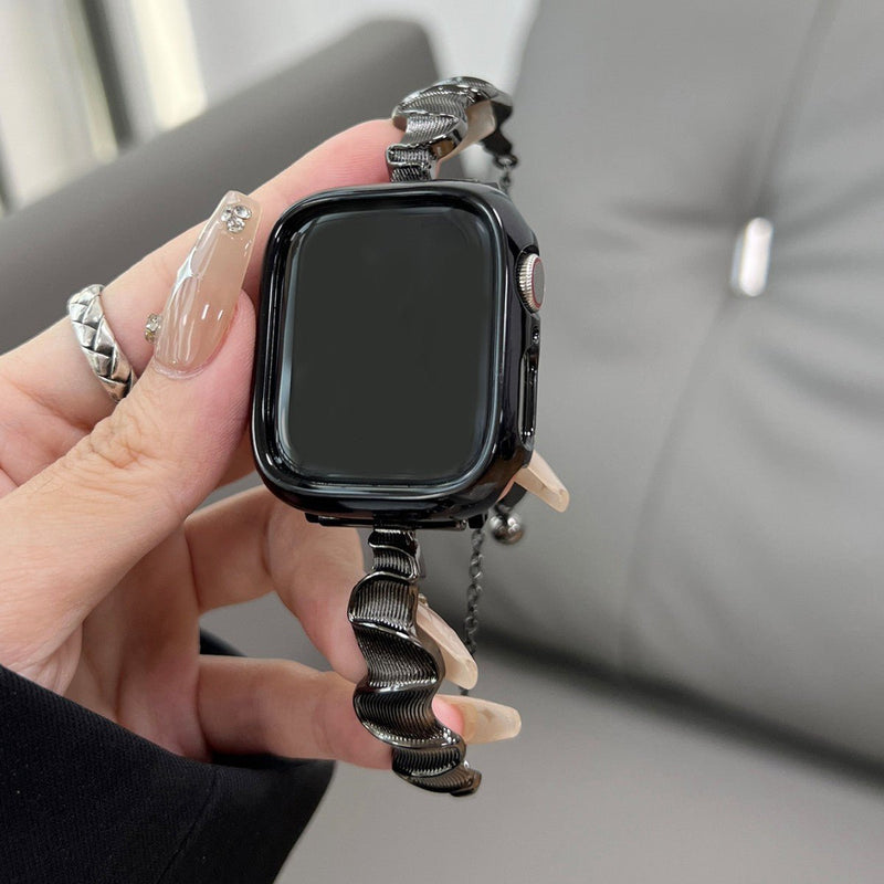Bracelet torsadé noir en métal pour Apple Watch, taille 38 à 42 mm, style élégant femme.