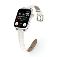 Bracelet Apple Watch femme en microfibre blanc avec boucle argentée, taille ajustable.