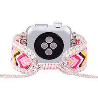 Bracelet Apple Watch femme en nylon rose et cristaux avec motif tissé coloré et perles décoratives.