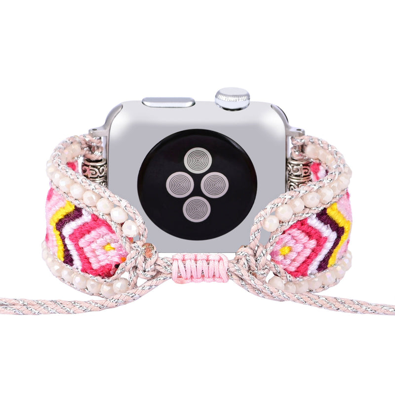 Bracelet Apple Watch femme en nylon rose et cristaux avec motif tissé coloré et perles décoratives.