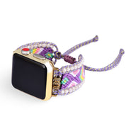 Bracelet Apple Watch en nylon violet avec cristaux décoratifs, style tressé ajustable pour femme.