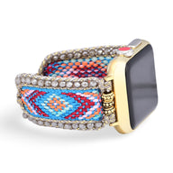 Bracelet Apple Watch en nylon bleu à motifs géométriques avec bordure de cristaux pour femme, modèle Mistral.
