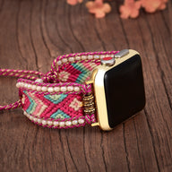 Bracelet Apple Watch multicolore en nylon tressé avec perles roses et détails en cristal, modèle Nixie.