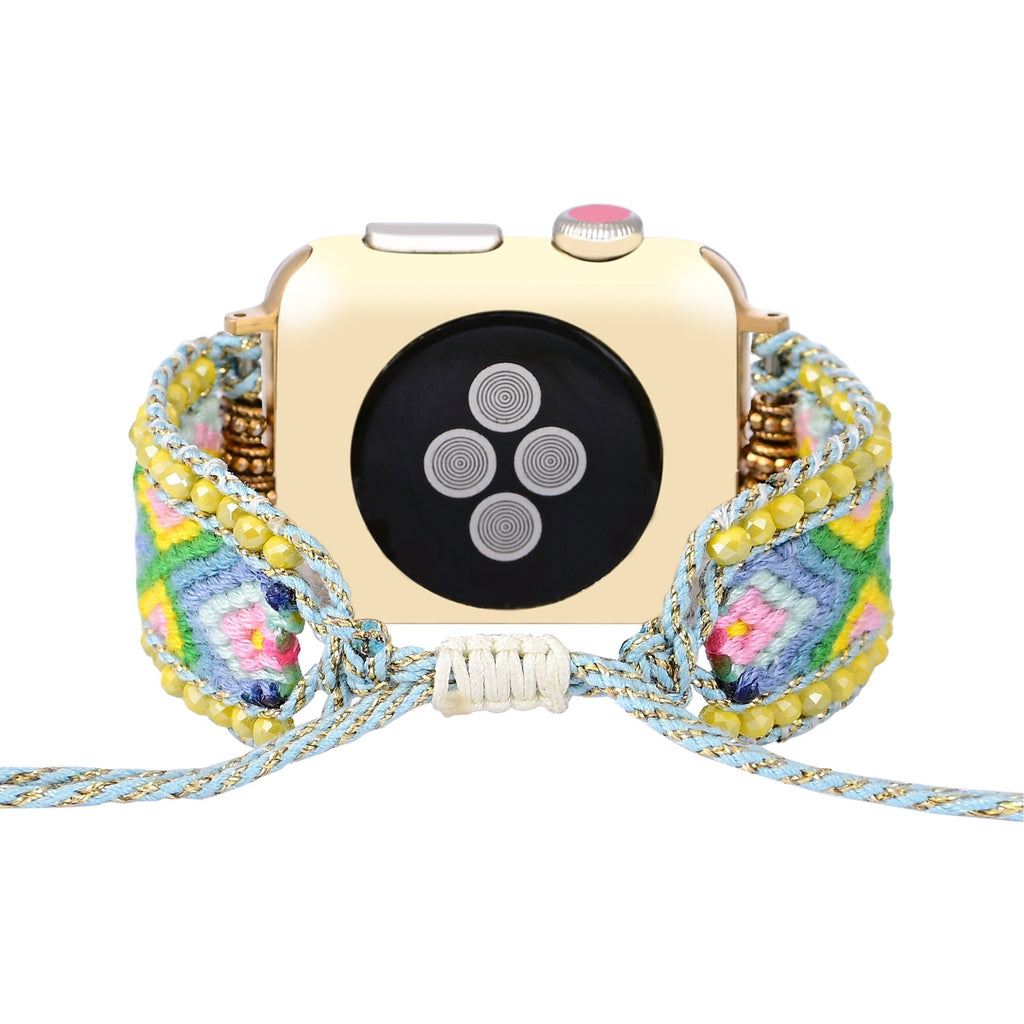 Bracelet Apple Watch en nylon tressé vert, bleu et jaune avec cristaux, style ethnique pour femme.