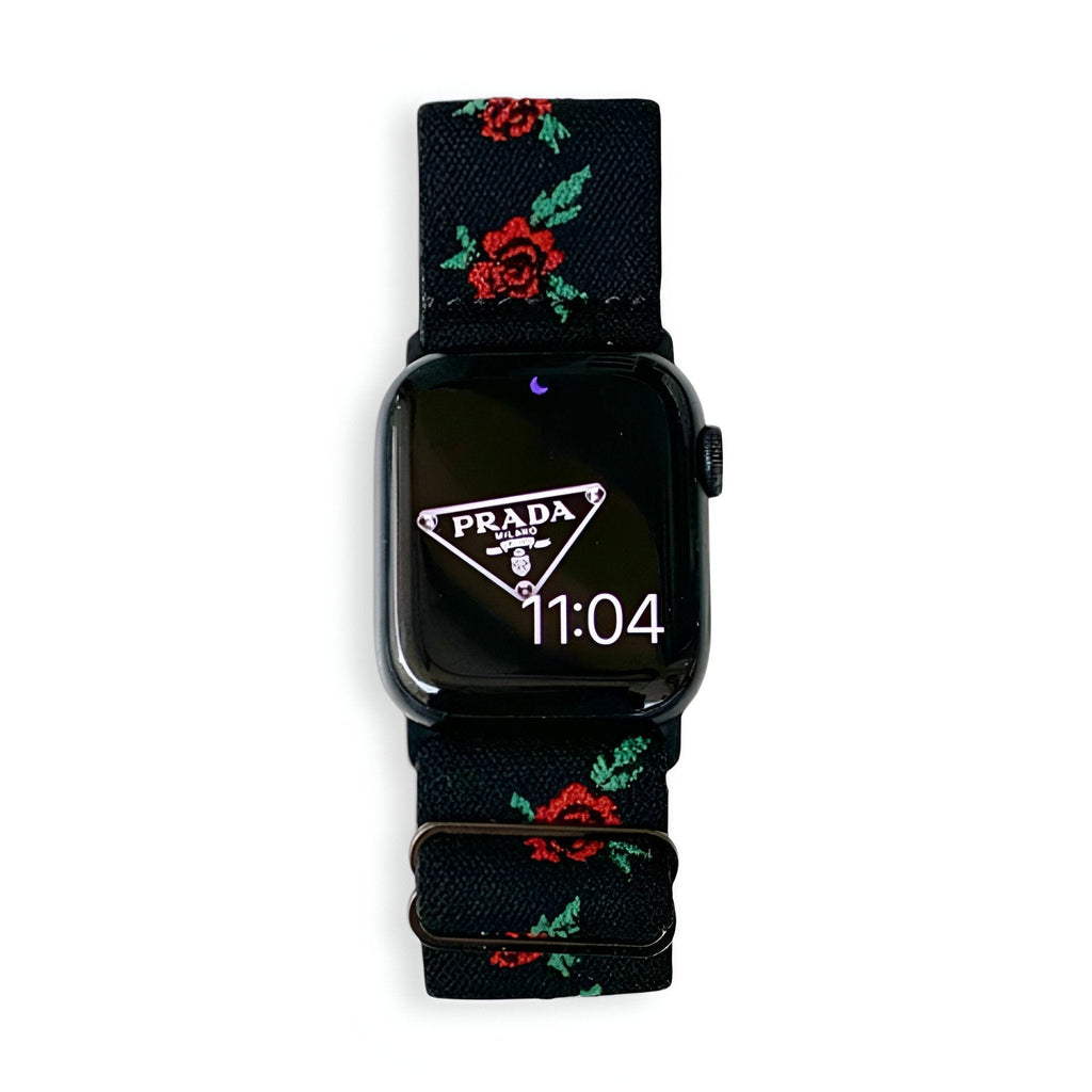 Bracelet Apple Watch en nylon noir avec motifs floraux rouges et verts, modèle Elexia, pour femme.