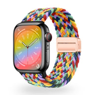 Bracelet Apple Watch en nylon tressé multicolore avec boucle rose doré.
