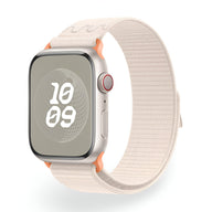 Bracelet Apple Watch en nylon blanc écru avec boucles orange et fermeture velcro, modèle Marix.