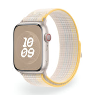 Bracelet Apple Watch en nylon blanc, jaune et orange, modèle Marix, taille 38 à 42 mm, avec bordure jaune.