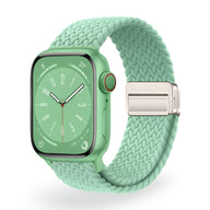 Bracelet Apple Watch Xylon en nylon tressé vert clair avec boucle argentée, taille 38 à 42 mm.