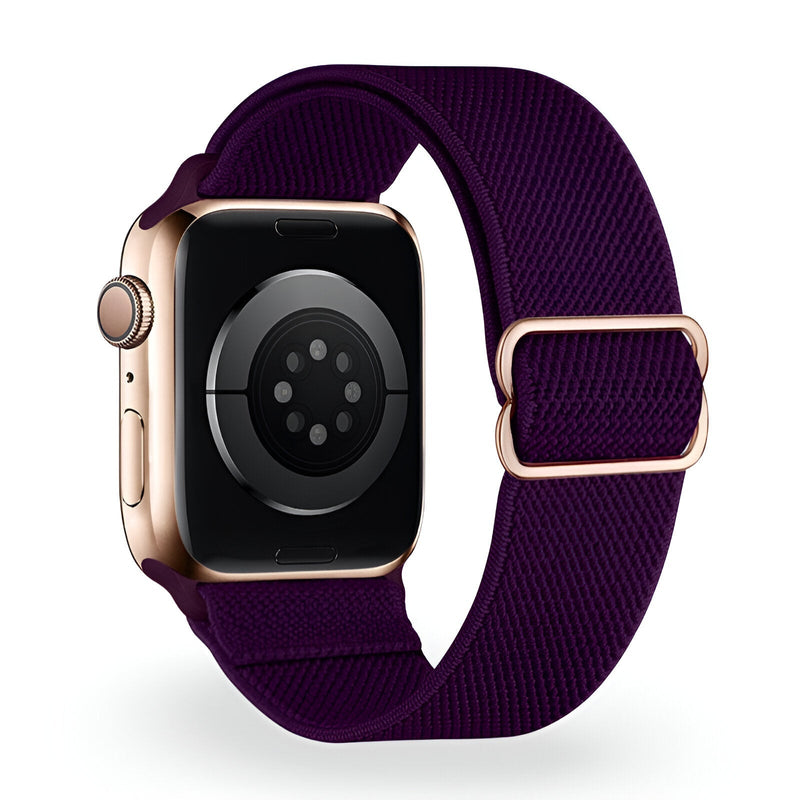 Bracelet Apple Watch en nylon violet, boucle métallique dorée, style tressé ajustable.