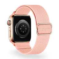 Bracelet Apple Watch en nylon saumon, modèle Zyra, taille 38-42 mm, fermoir métallique rose pâle.