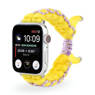 Bracelet Apple Watch en nylon jaune et lavande tressé, adapté pour 38 à 42 mm.
