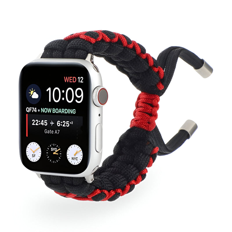 Bracelet Apple Watch en nylon noir avec surpiqûres rouges et fermoir ajustable.