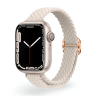 Bracelet Apple Watch en nylon beige clair tressé avec boucle en métal doré rose.