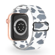 Bracelet Apple Watch en nylon blanc avec motif gris abstrait, pour femme.