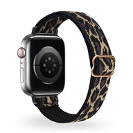 Bracelet Apple Watch en nylon tissé à motif léopard noir et beige, boucle en métal doré rose.