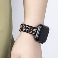 Bracelet Apple Watch en nylon tissé motif léopard noir et beige pour femme, taille 38-42 mm.