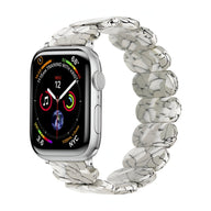 Bracelet Apple Watch en résine blanc tacheté avec maillons larges pour femme modèle Ilya.