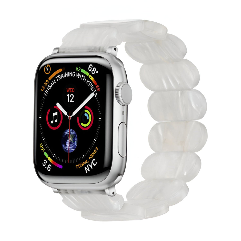 Bracelet Apple Watch pour femme en résine blanche tachetée avec maillons ovales translucides.