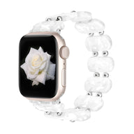 Bracelet en résine blanche translucide pour Apple Watch avec perles rondes et argentées, style sauvage.