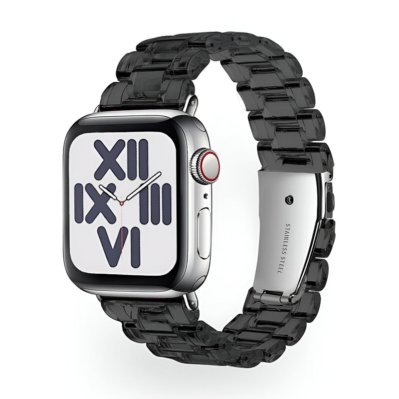 Bracelet Apple Watch femme en résine transparente noire, maillons larges, fermoir métallique argenté.