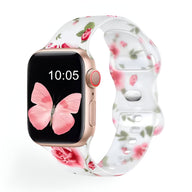 Bracelet Apple Watch en silicone blanc transparent avec motifs floraux roses et rouges pour femme.