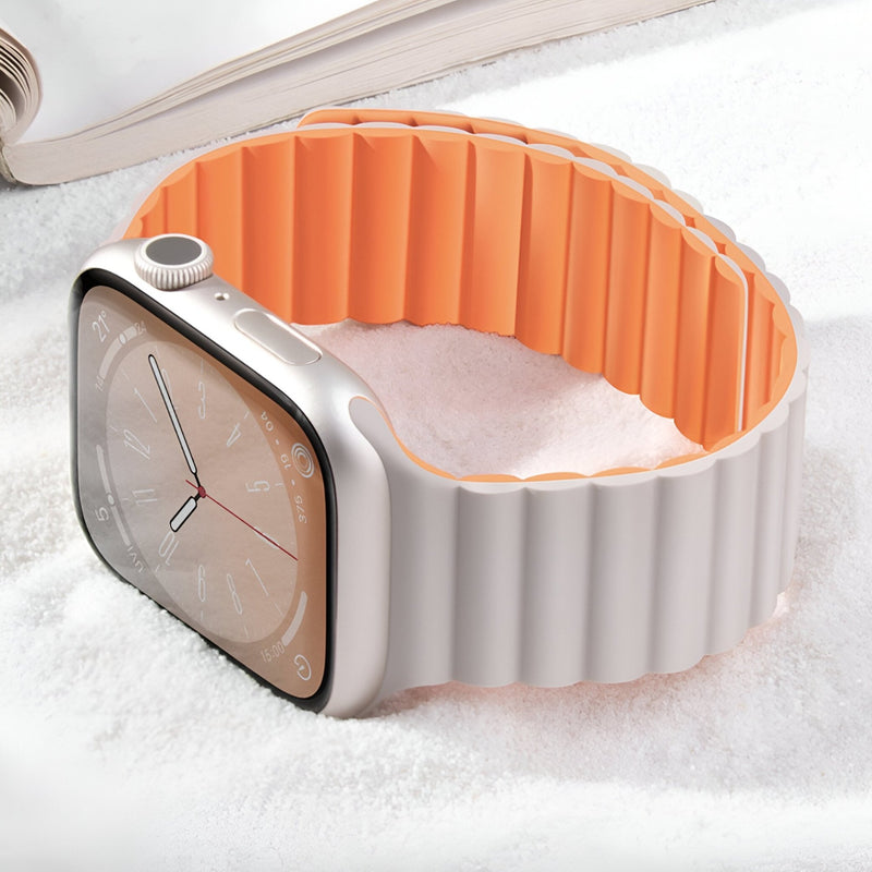 Bracelet Apple Watch silicone gris clair extérieur et orange intérieur, style sport ondulé, taille 38-42 mm.