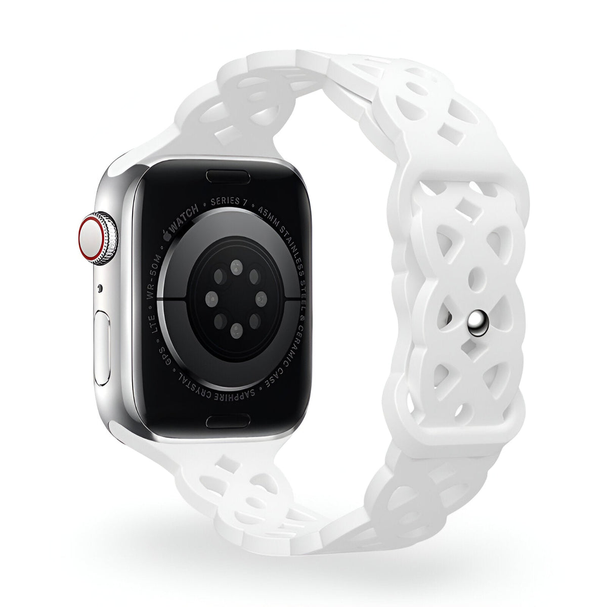 Bracelet Apple Watch en silicone blanc à motif ajouré style Astra, fermé par un orifice métallique.